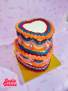 Absolutely loved this colour scheme! 🧡🤍🩷🩵😍

I have space for a couple of extra cakes this week! For collection on Friday, so shout for cute cakes 🧁 

Always hand made, no pre mixes, made with love 🩷  #jodiebakes #bespokecakesleeds #childrenscakes #lambethcakes #leedsbaker #cakesofinstagram #weddingcakes #brownieboxes #orderonline #postalbakes #brownies #blondies #cakesleeds #browniesbypost #bespokecakes #bestcakesleeds  🌐 Order online jodiebakes.co.uk 💌 hello@jodiebakes.co.uk